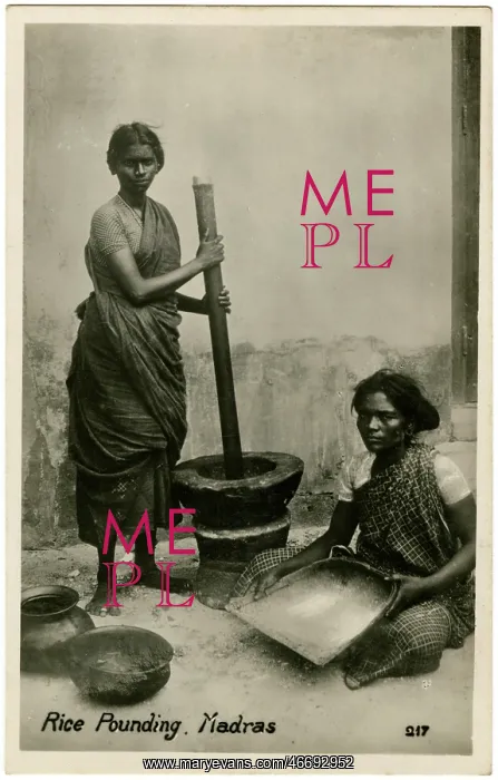 : Pounding Rice using large pestle and mortar - Chennai, India : Pounding Rice using large pestle and mortar - Chennai, India