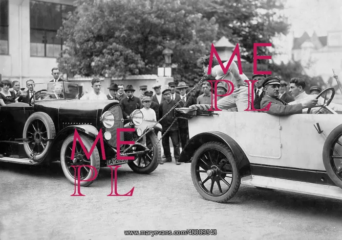  : Power artist pulls car with his teeth, 1925