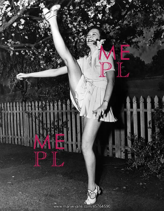 : Practicing her high kicks : Practicing her high kicks