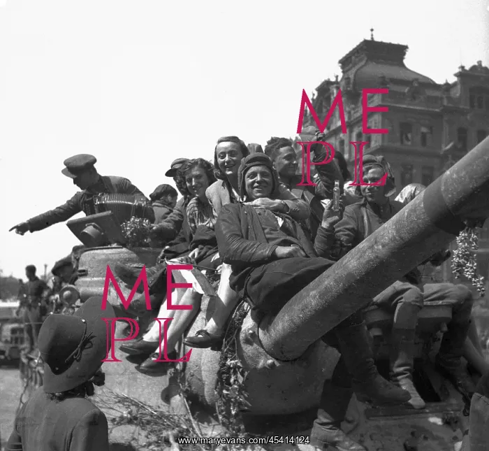 : Prague citizens sitting with Soviet soldiers at : Prague citizens sitting with Soviet soldiers at