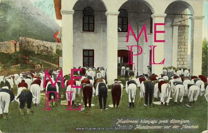 : Praying Muslims in front of a mosque : Praying Muslims in front of a mosque