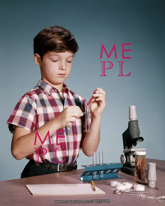 : Pre-Teen Boy Playing with Test Tube Microscope : Pre-Teen Boy Playing with Test Tube Microscope