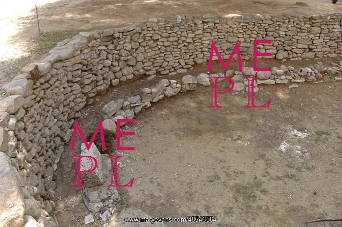 : Prehistoric Art. Bronze Age. Stone foundation of an apsidal : Prehistoric Art. Bronze Age. Stone foundation of an apsidal
