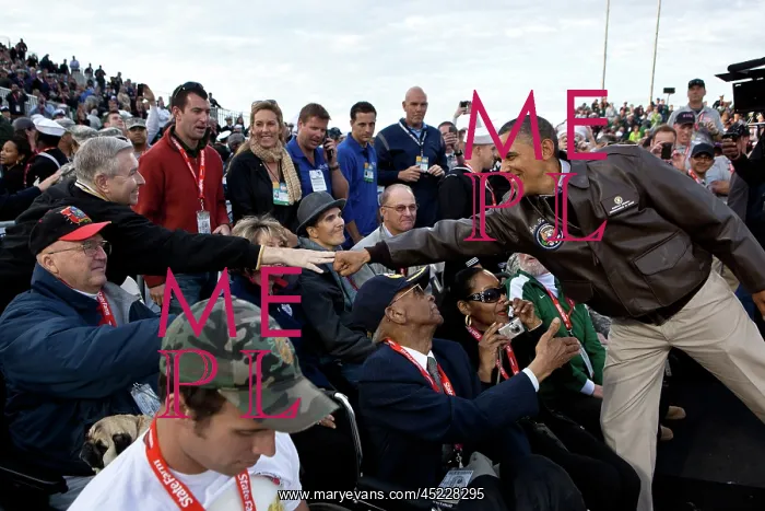 : President Barack Obama greets veterans before ? : President Barack Obama greets veterans before ?