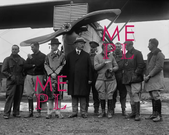 : President Calvin Coolidge with aviators of the first-around- : President Calvin Coolidge with aviators of the first-around-