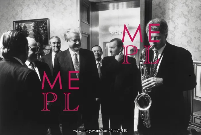 : President Bill Clinton plays the saxophone presented : President Bill Clinton plays the saxophone presented