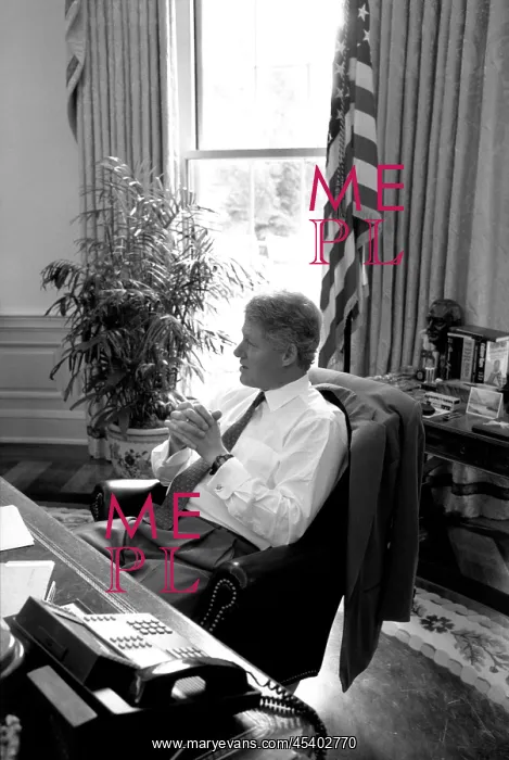 : President Bill Clinton in shirtsleeves at his : President Bill Clinton in shirtsleeves at his