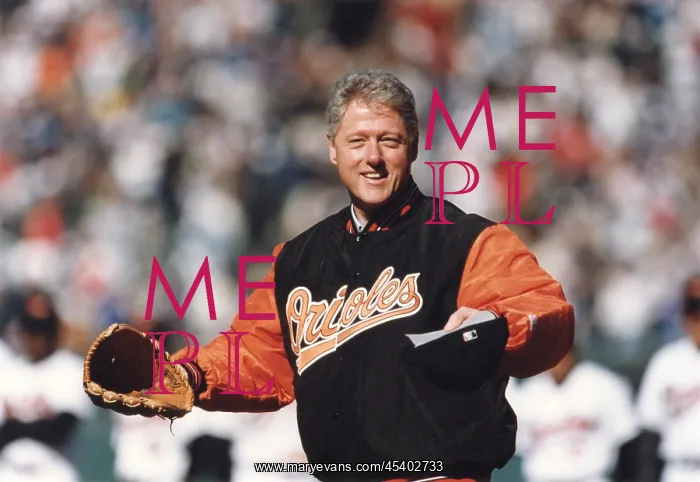 : President Bill Clinton throwing out the first : President Bill Clinton throwing out the first