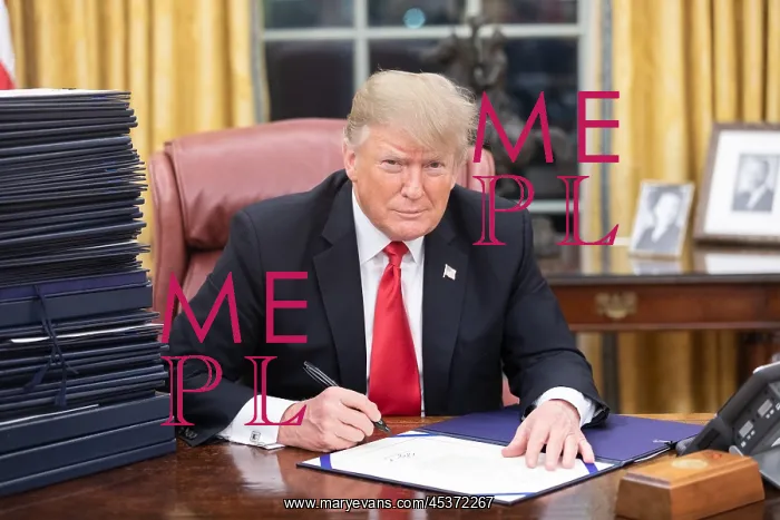 : President Donald Trump signing documents on : President Donald Trump signing documents on
