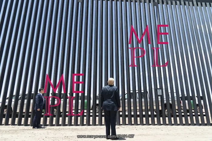 : President Donald Trump stands before a section : President Donald Trump stands before a section