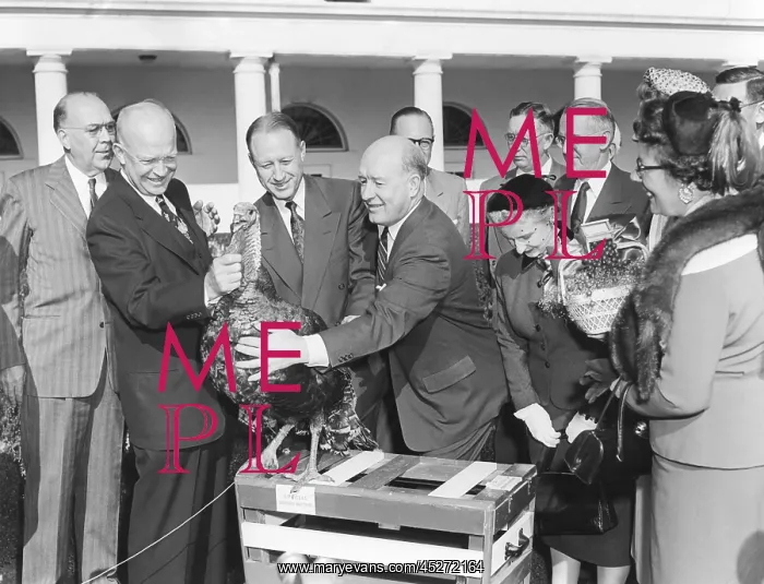 : President Dwight Eisenhower receives a turkey from : President Dwight Eisenhower receives a turkey from