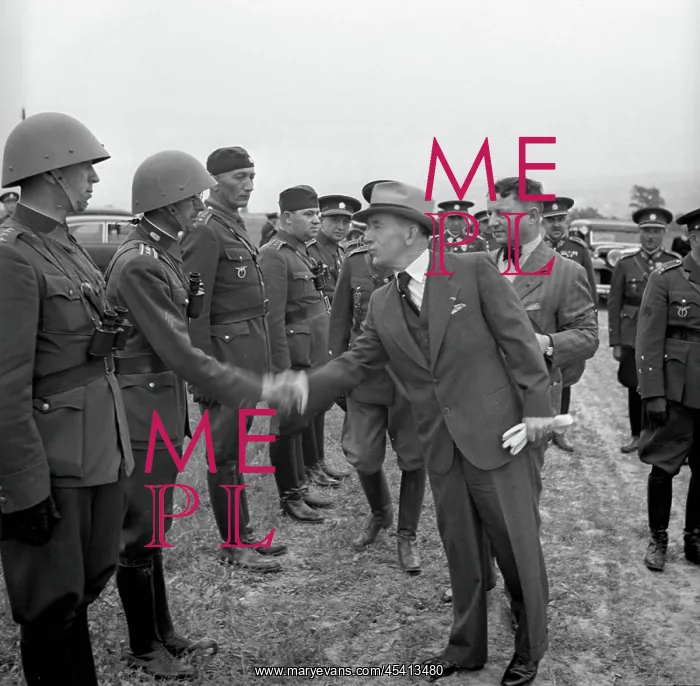 : President Edvard Benes, with bow tie, during air raid drill : President Edvard Benes, with bow tie, during air raid drill
