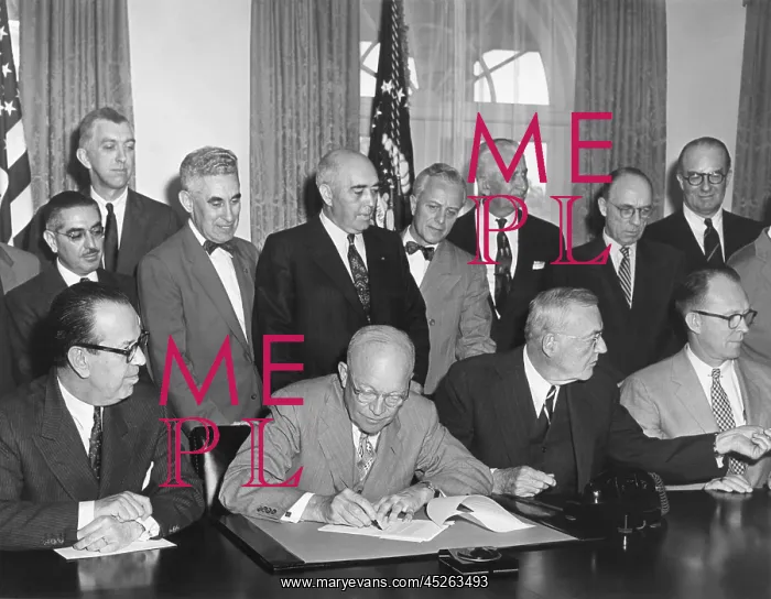 : President Eisenhower initialing the first agreement : President Eisenhower initialing the first agreement