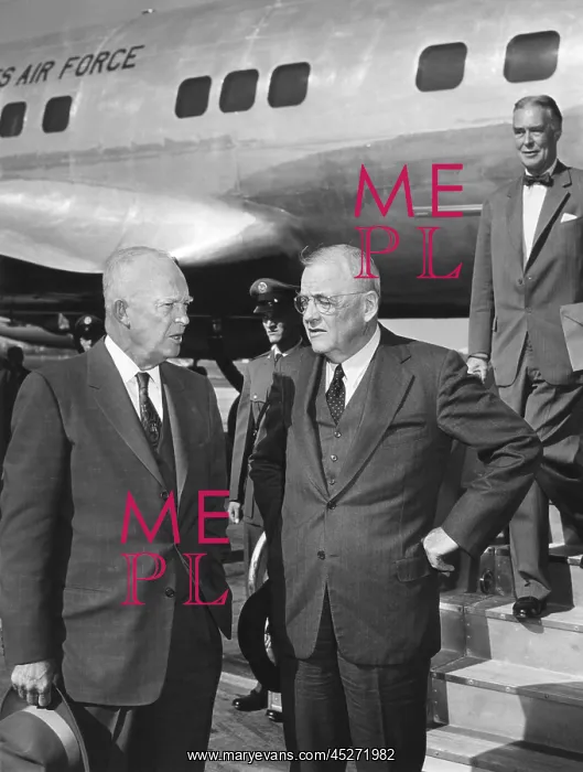 : President Eisenhower was met by Sec. of State John : President Eisenhower was met by Sec. of State John