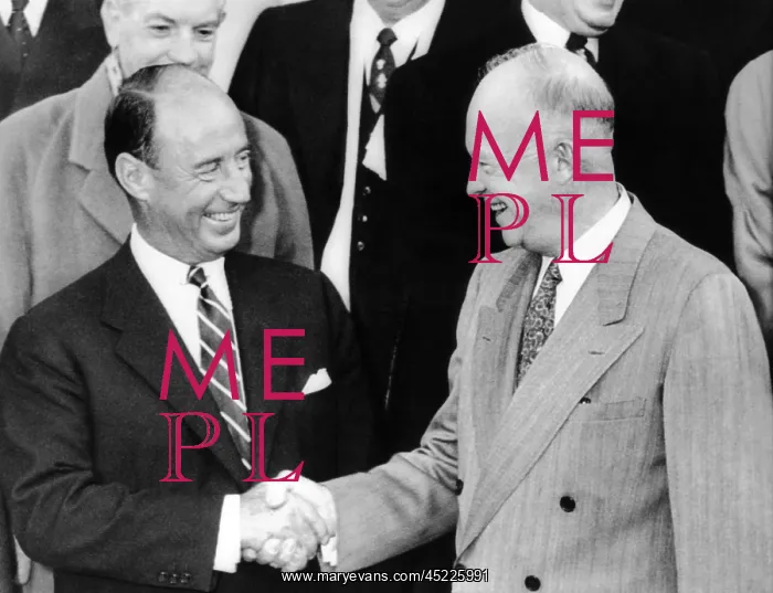 : President Eisenhower shakes hands with his ? : President Eisenhower shakes hands with his ?