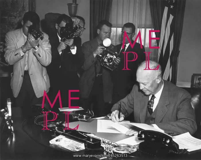 : President Eisenhower signing a Resolution to Promote : President Eisenhower signing a Resolution to Promote