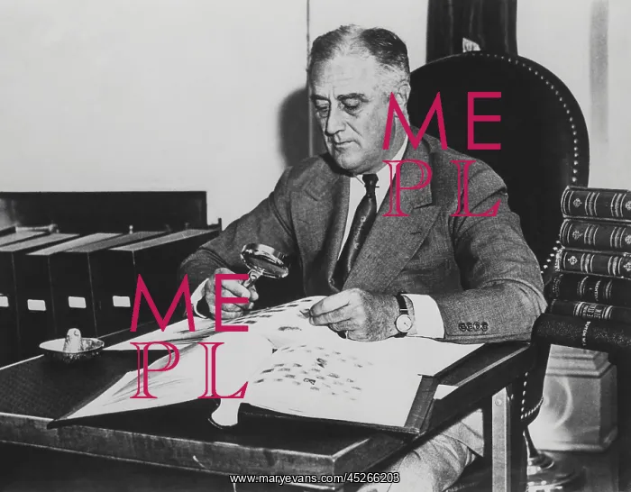 : President Franklin Roosevelt with his stamp collection : President Franklin Roosevelt with his stamp collection