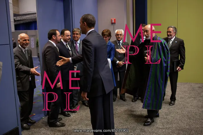 : President Hamid Karzai of Afghanistan presents ? : President Hamid Karzai of Afghanistan presents ?
