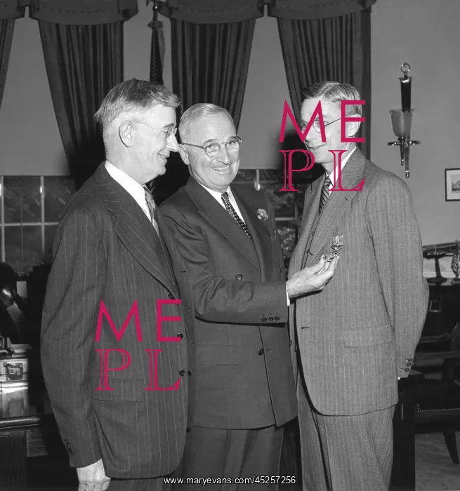 : President Harry Truman, center, presenting chemist : President Harry Truman, center, presenting chemist