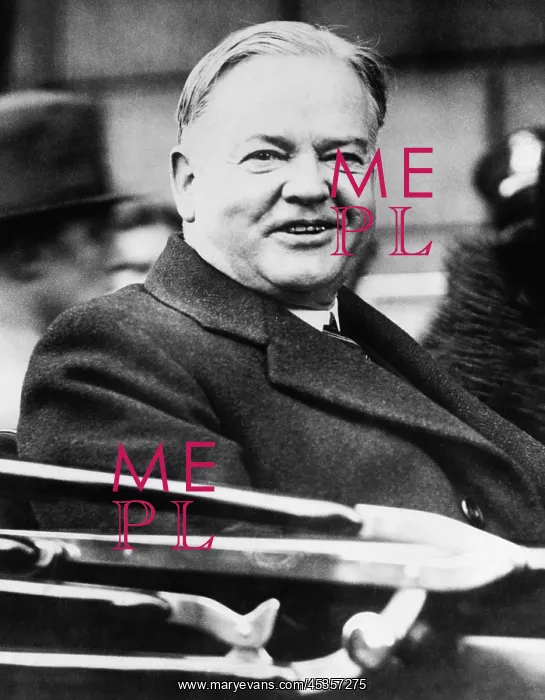 : President Herbert Hoover smiling from an open car : President Herbert Hoover smiling from an open car