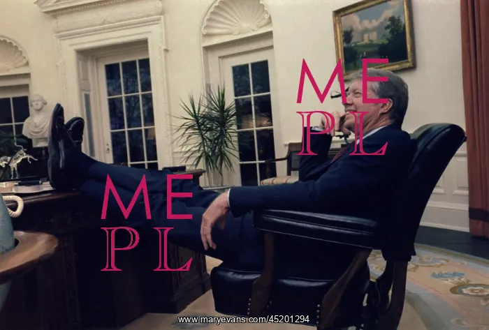 : President Jimmy Carter sitting with his ? : President Jimmy Carter sitting with his ?