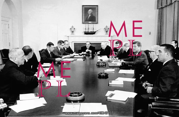 : President John Kennedy meets with his cabinet. ? : President John Kennedy meets with his cabinet. ?