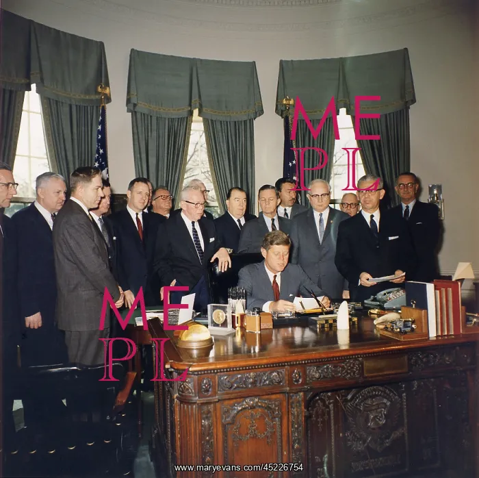: President Kennedy signing the Manpower Development ? : President Kennedy signing the Manpower Development ?