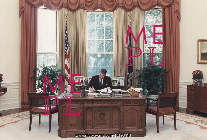 : President Reagan working at his desk in ? : President Reagan working at his desk in ?