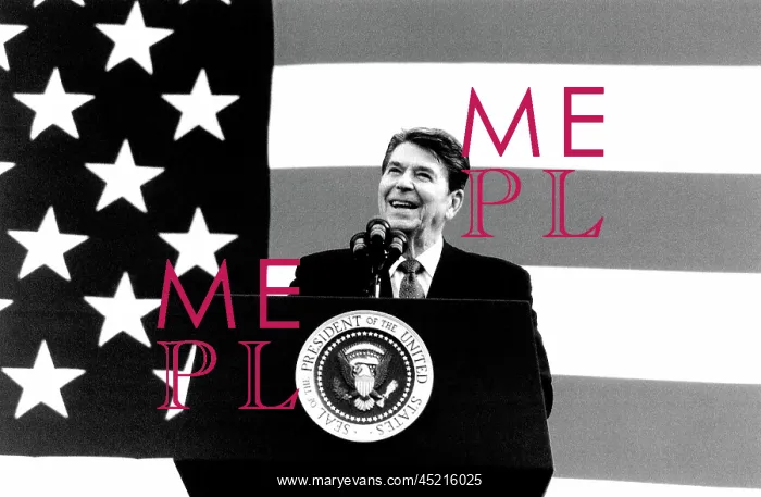 : President Ronald Reagan at a podium with ? : President Ronald Reagan at a podium with ?