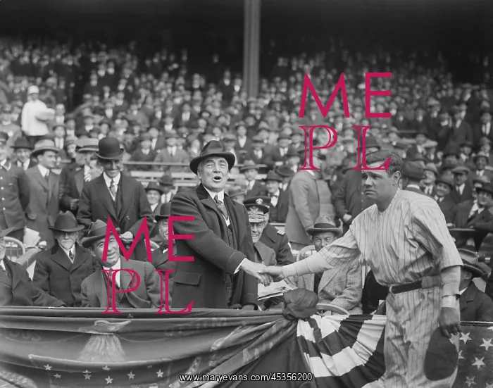 : President Warren Harding shakes hands with Babe : President Warren Harding shakes hands with Babe