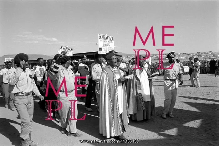 : Priests lead the coffin procession of the Cradock : Priests lead the coffin procession of the Cradock