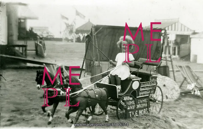 : Primative Fairground / Beach Amusements - Girl on buggy : Primative Fairground / Beach Amusements - Girl on buggy