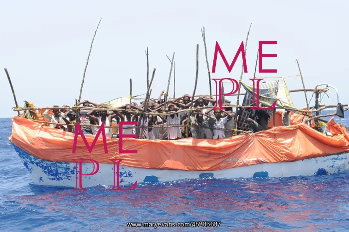 : Primitive boat crowded with suspected pirates ? : Primitive boat crowded with suspected pirates ?