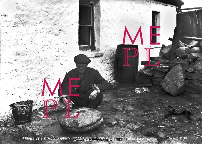  : Primitive Method of Grinding Corn With Quern on Inishmurray