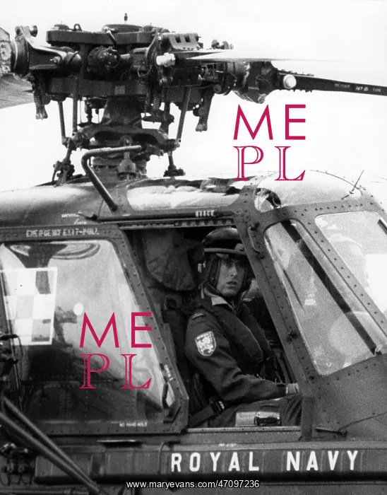 : Prince Charles piloting a Royal Navy helicopter : Prince Charles piloting a Royal Navy helicopter