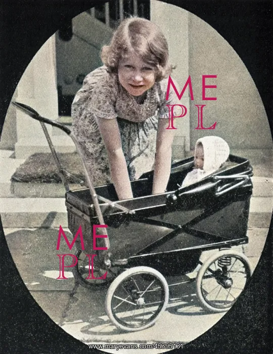 : Princess Elizabeth playing with doll's pram : Princess Elizabeth playing with doll's pram