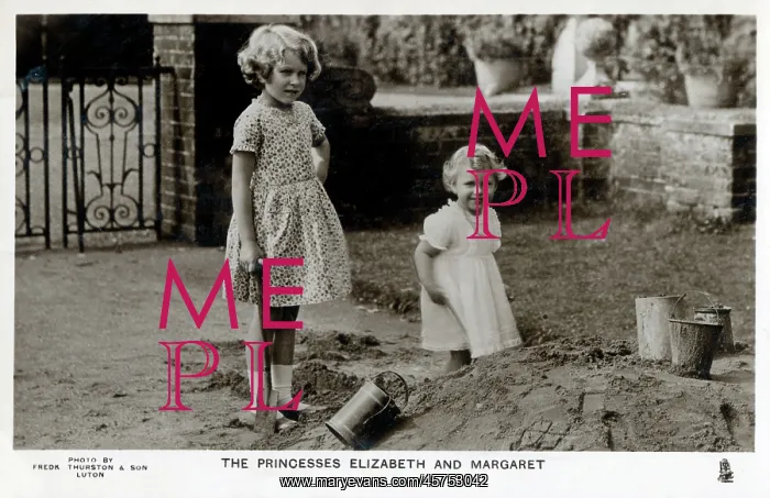 : Princesses Elizabeth and Margaret playing in a sandpit : Princesses Elizabeth and Margaret playing in a sandpit