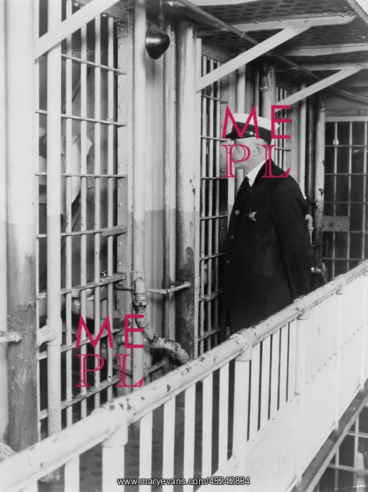 : A prison guard at the Cook County jail standing ? : A prison guard at the Cook County jail standing ?