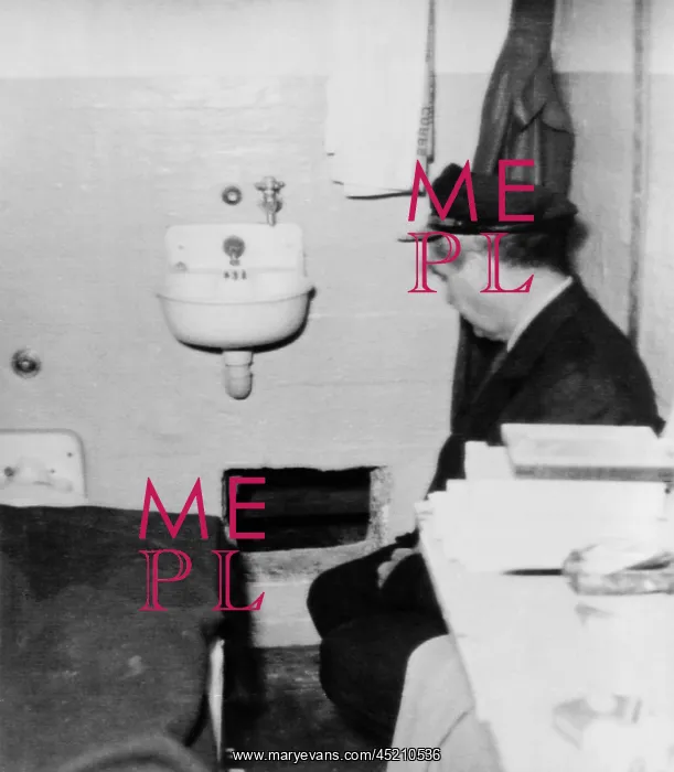 : Prison guard sits inside the Alcatraz cell ? : Prison guard sits inside the Alcatraz cell ?