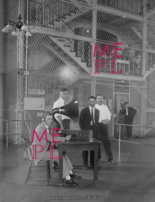 : Prisoners in a Washington D.C. vicinity jail listen : Prisoners in a Washington D.C. vicinity jail listen