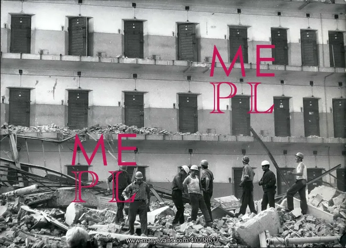 : Prisons. Jun. 16, 1969 - These workers are standing in the ruins of what : Prisons. Jun. 16, 1969 - These workers are standing in the ruins of what
