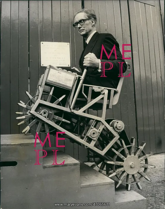 : Professor Meredith Thring and spoke-wheeled chair : Professor Meredith Thring and spoke-wheeled chair