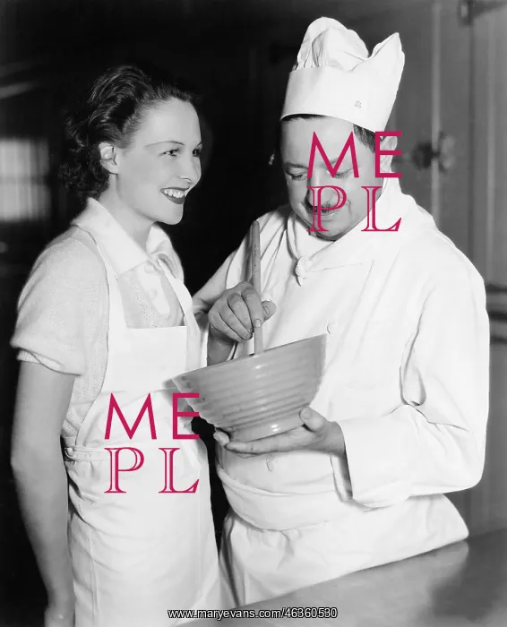 : Profile of a chef stirring a mixture in a bowl and : Profile of a chef stirring a mixture in a bowl and