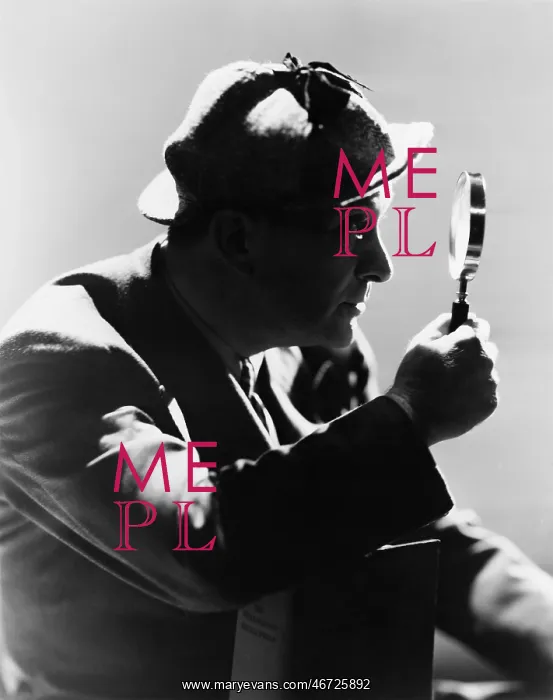 : Profile of a man looking through a magnifying glass : Profile of a man looking through a magnifying glass