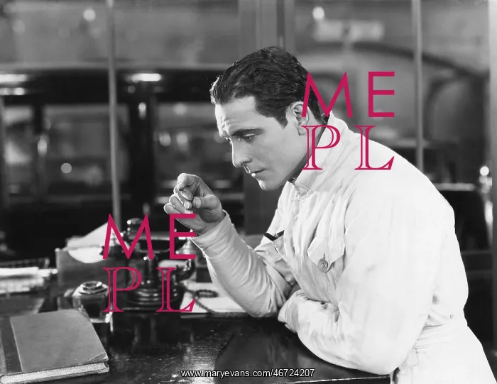 : Profile of a man starring a telephone : Profile of a man starring a telephone