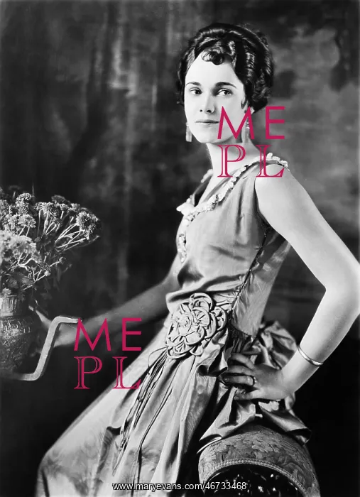 : Profile of a woman holding a vase : Profile of a woman holding a vase