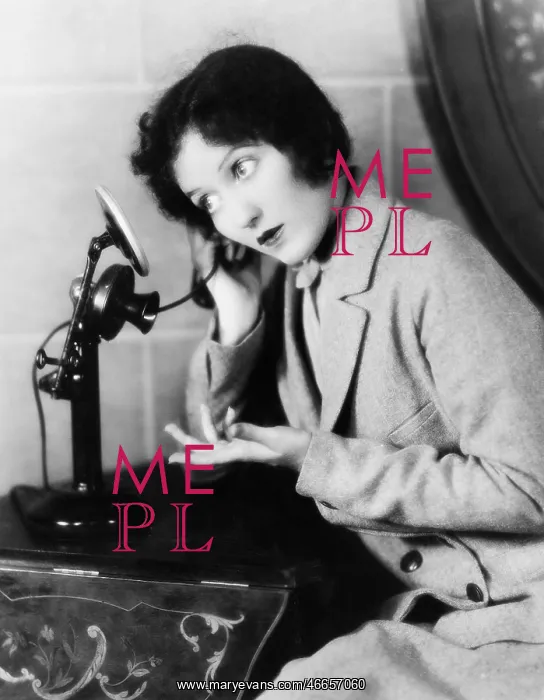 : Profile of a woman talking on the telephone : Profile of a woman talking on the telephone