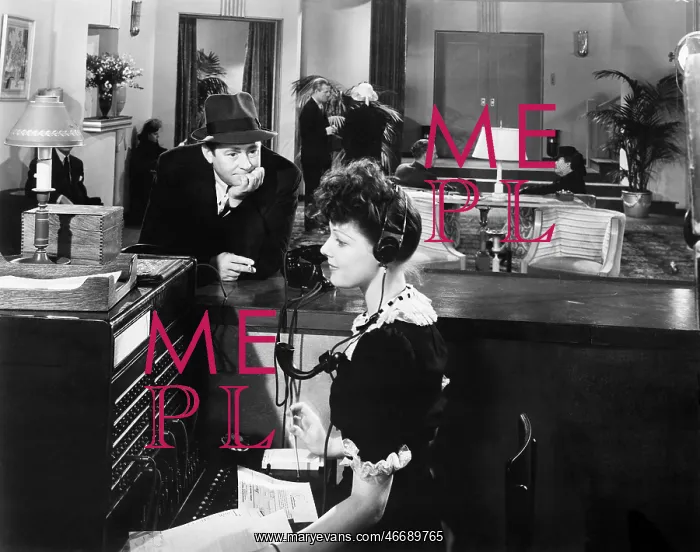 : Profile of a woman working on the telephone switchboard : Profile of a woman working on the telephone switchboard