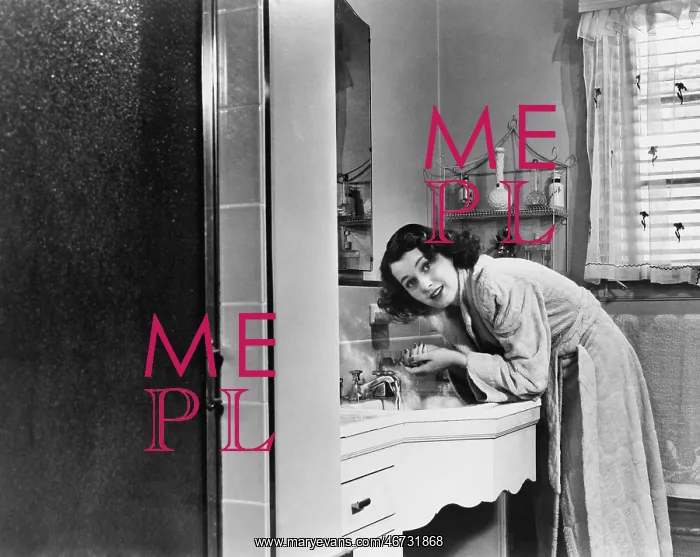  : Profile of a young woman washing her hands in the