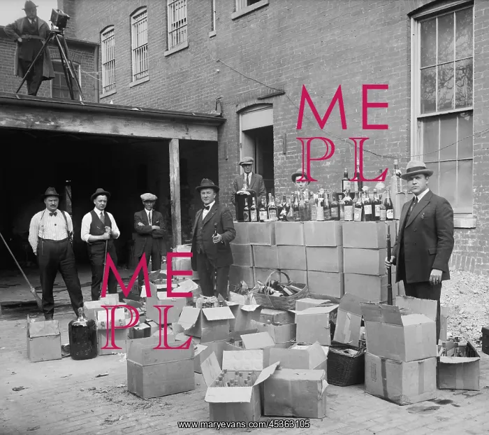 : Prohibition agents stand with boxes and bottles : Prohibition agents stand with boxes and bottles